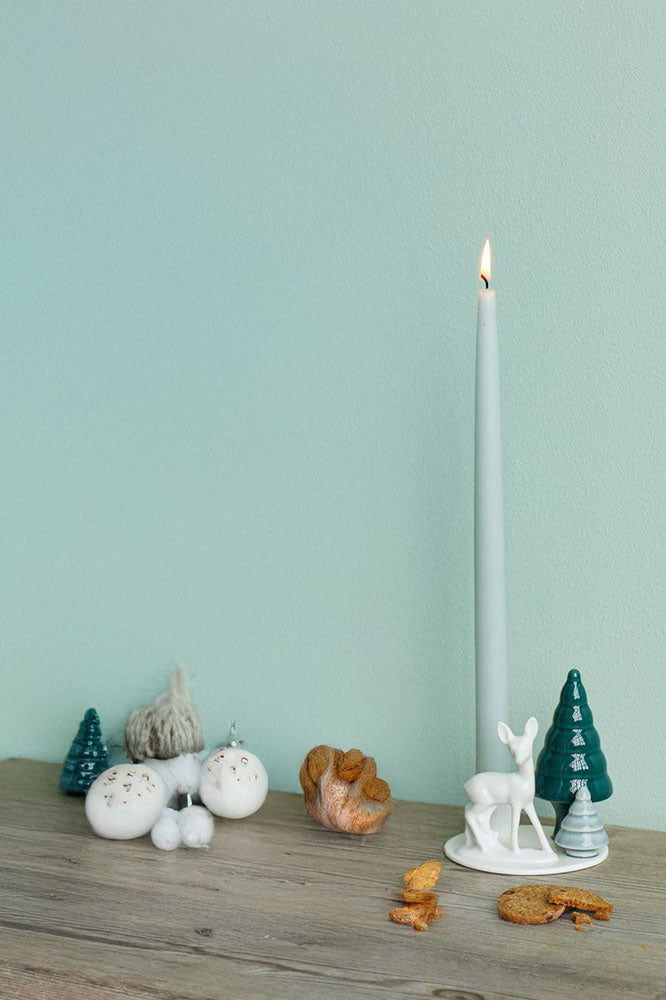 Porcelain candle holder with deer and fir trees for candles ø 22mm