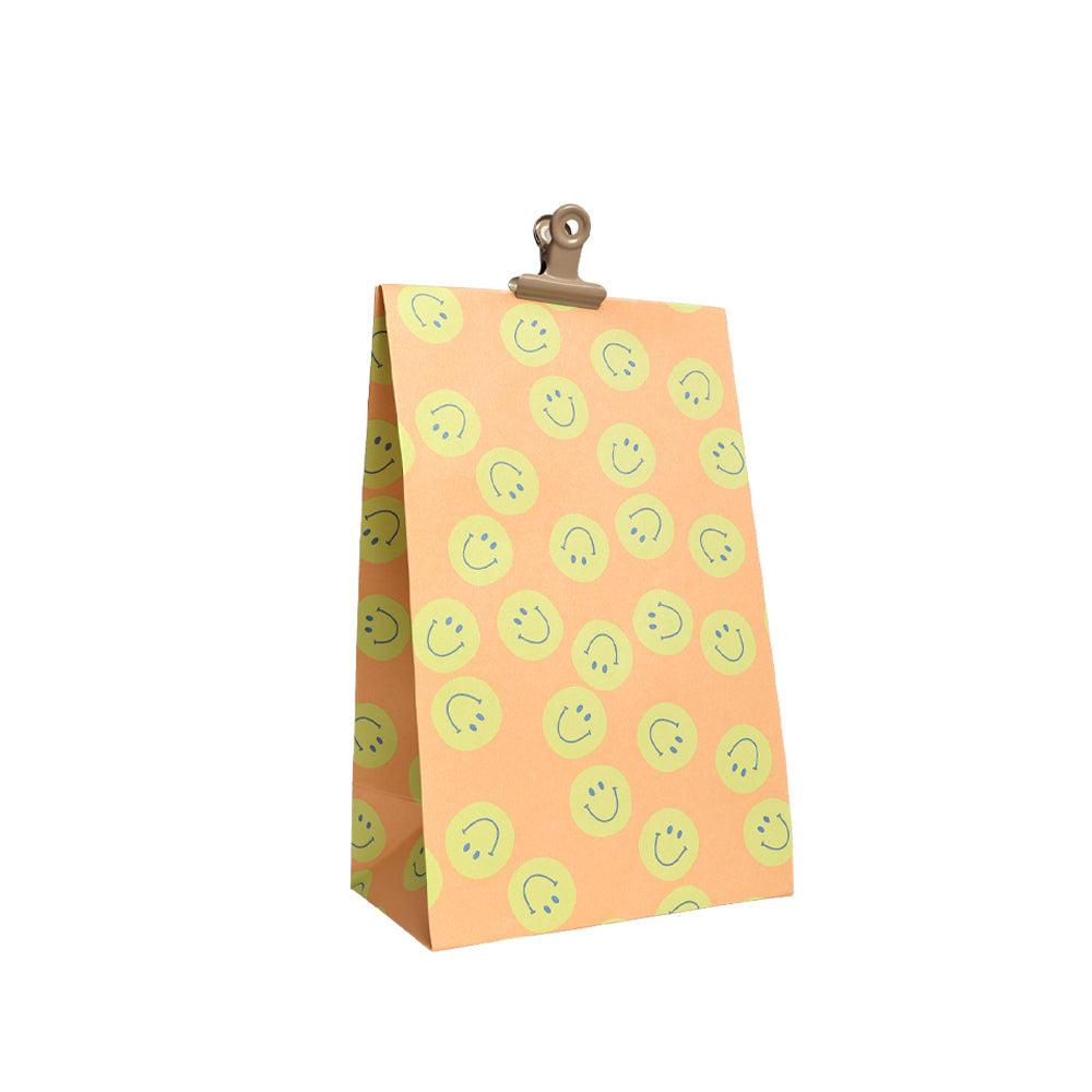 Papiergeschenktüte Smile orange (S, mit Boden)