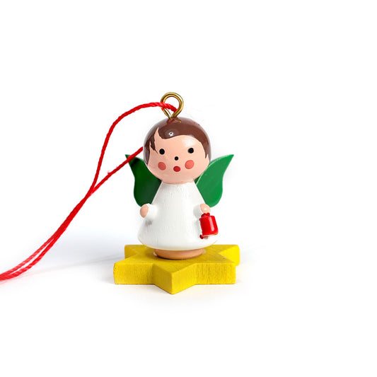 Little angel on a yellow star with a lantern