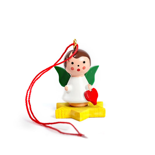 Little angel on yellow star with heart