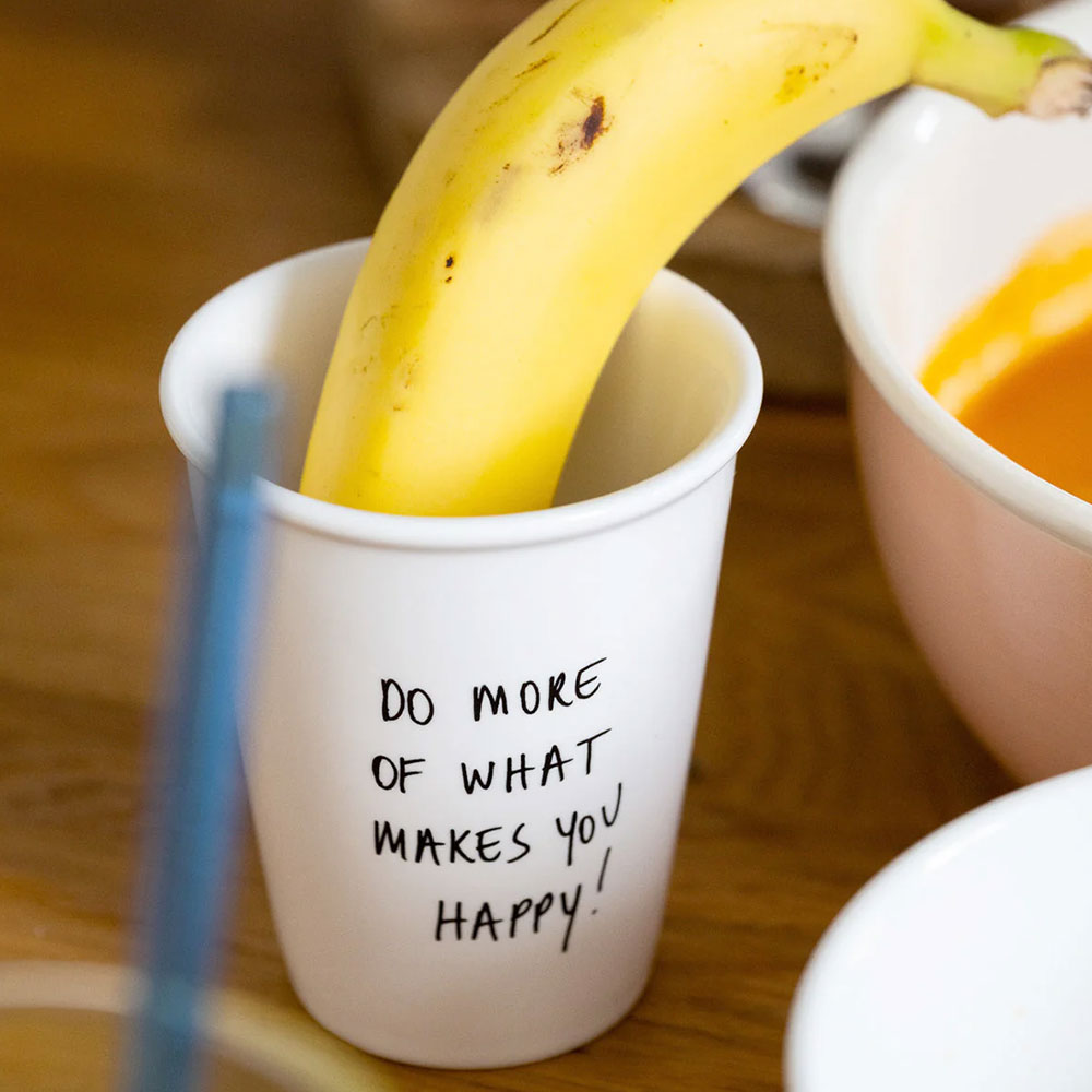 Porzellanbecher Do more of what makes you happy – Bild 3